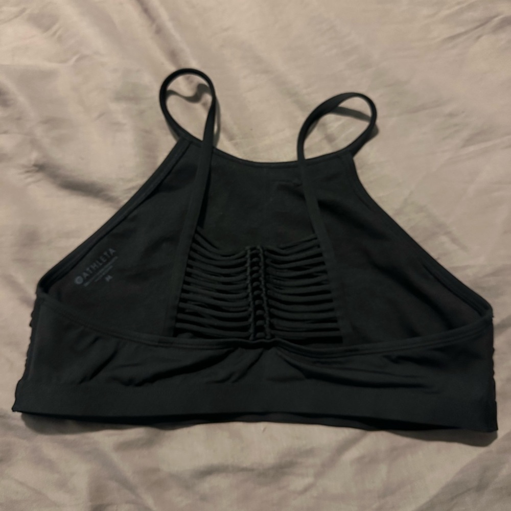 Black swimsuit top by Athleta.
